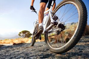 mountain biker trail riding closeup