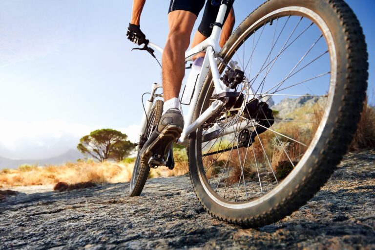 mountain biker trail riding closeup